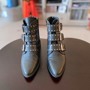 Black ankle boots with buckle detail